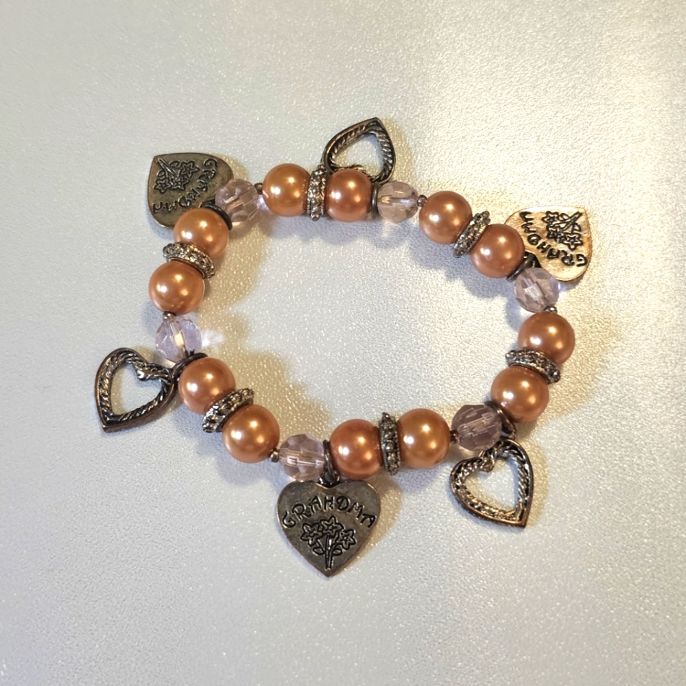 Charming Heart Bracelet with Gold and Silver Accents